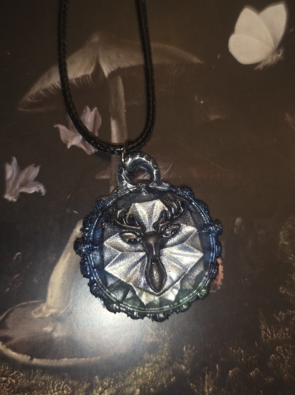 Geometric Resin Pendant With Small Deer In Center On Black Cord Necklace
